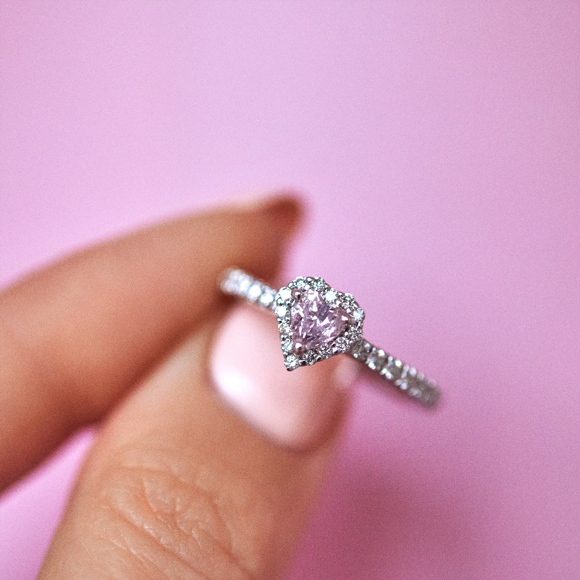 Platinum heart shaped pink diamond ring