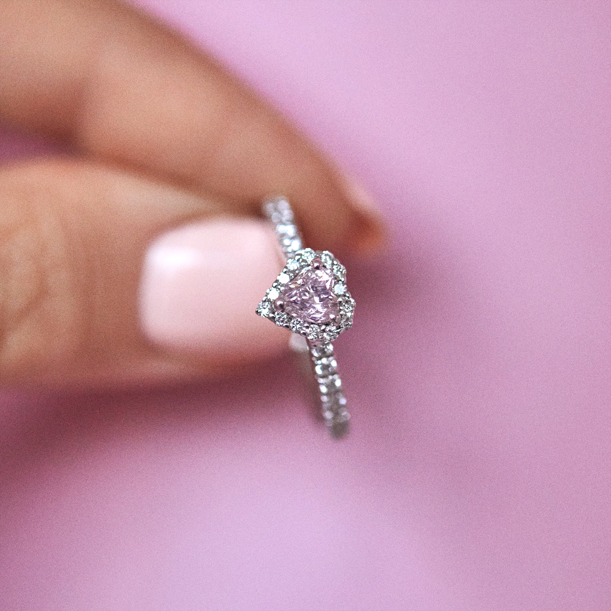 Platinum heart shaped pink diamond ring