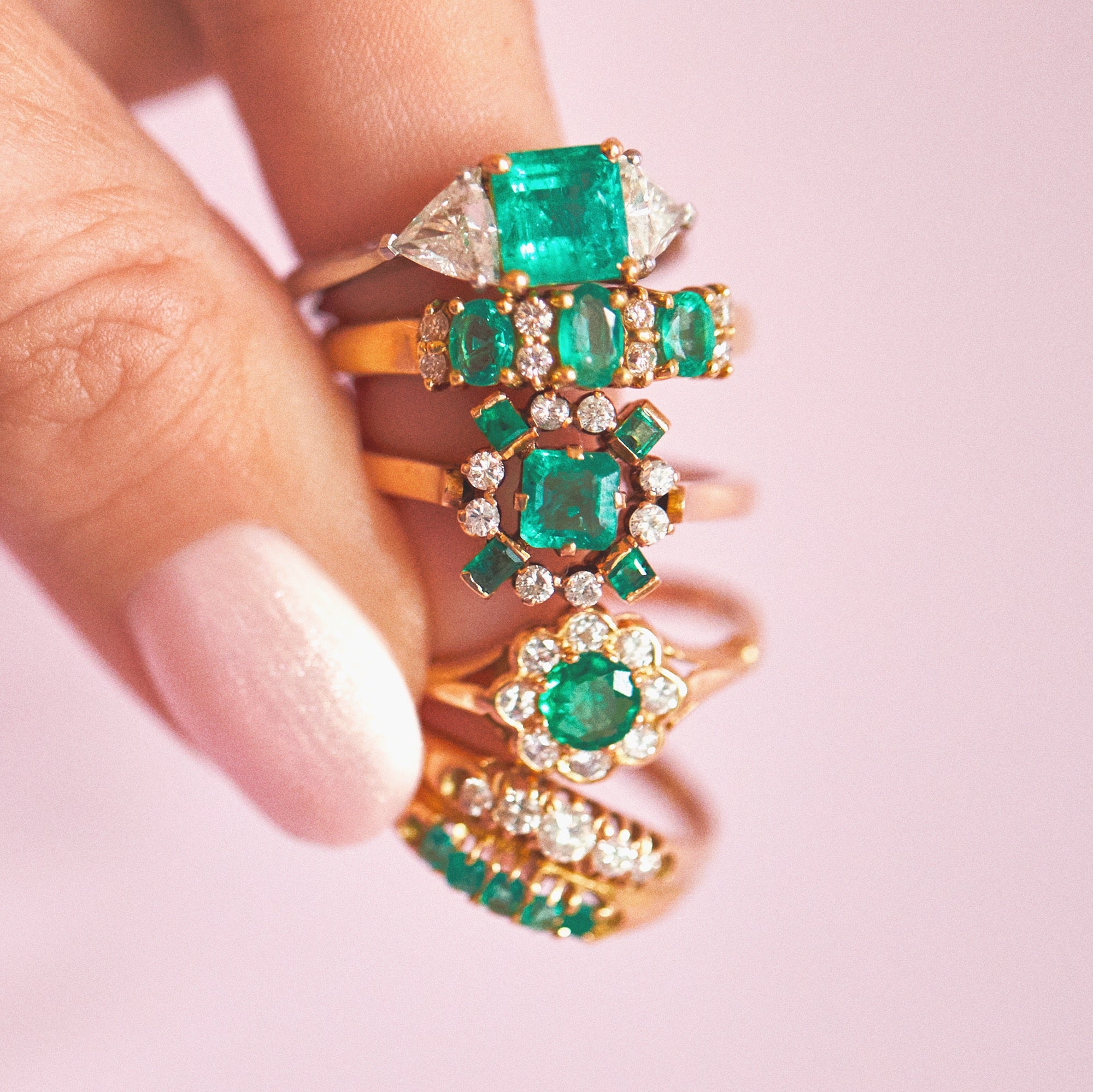 18ct gold ring set with emeralds and diamonds