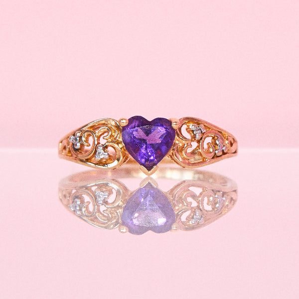 10ct gold ring set with a heart shaped amethyst and diamonds