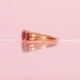 18ct gold carved ring with five garnets and diamonds