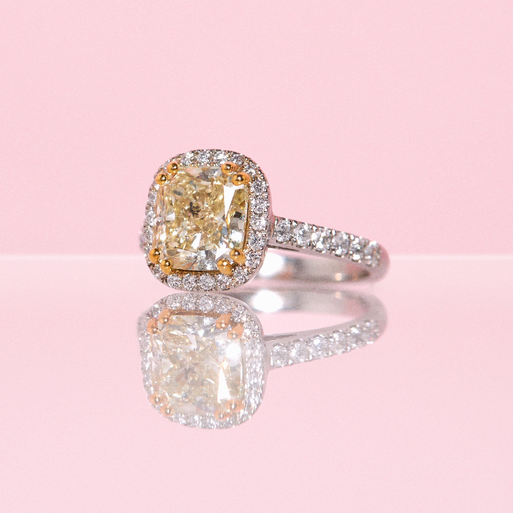 Platinum 3ct cushion cut yellow diamond halo ring