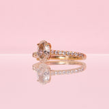 18ct gold ring set with a 1ct central diamond on a diamond band