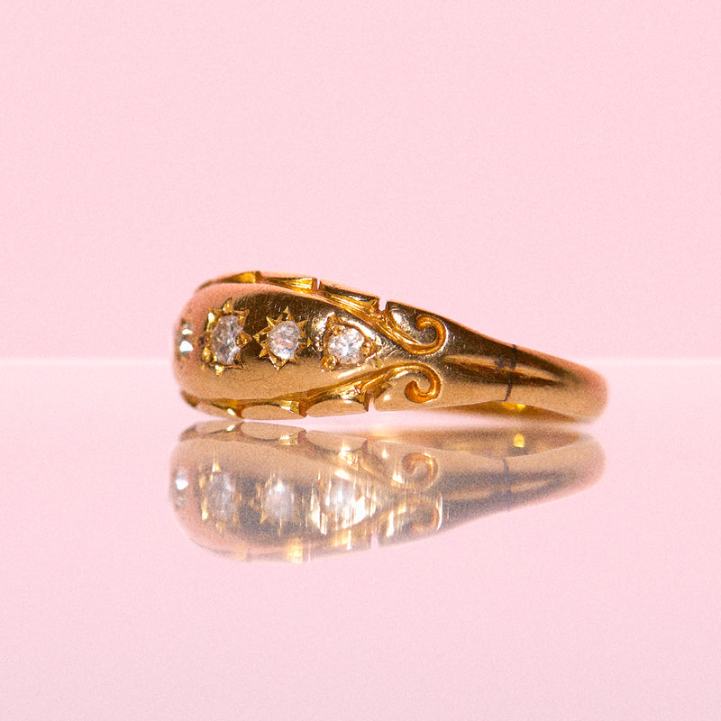 18ct gold gypsy ring set with five diamonds in a carved band