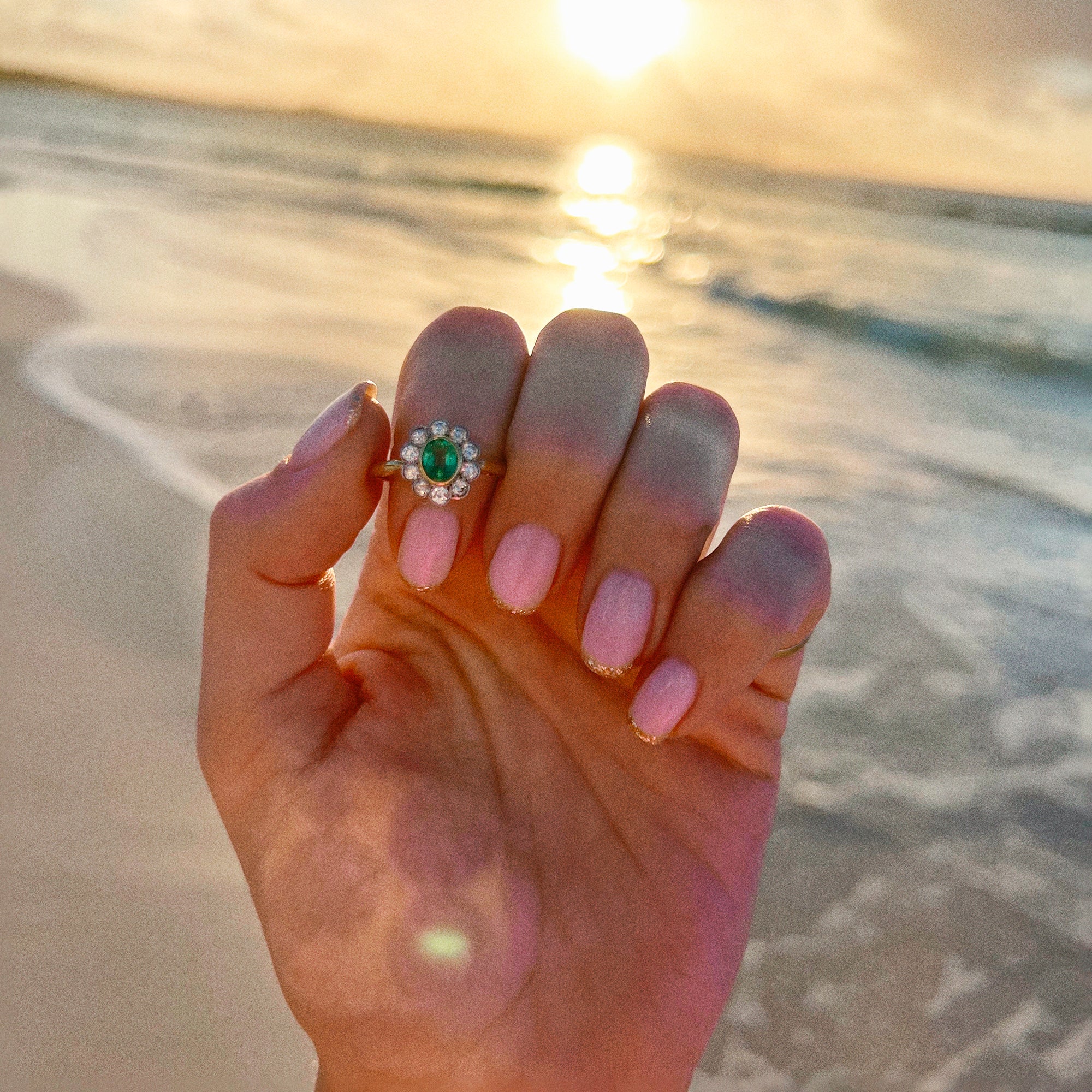 18ct gold emerald and diamond ring